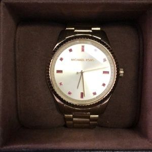 Gold band Michael Kors watch. Barely used. Like new